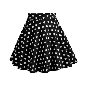Detail eines Vintage-A-Linien-Rocks mit hoher Taille und weißen Polka-Dot-Mustern