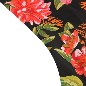 Close-up of vibrant floral print on premium woven fabric for vintage Hepburn style dress