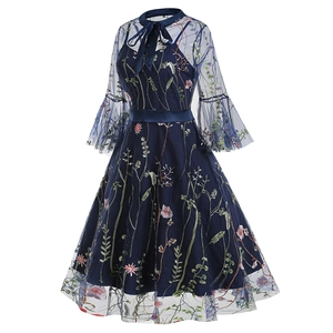 Exquisite floral embroidery and delicate mesh detail on dark blue vintage gothic dress