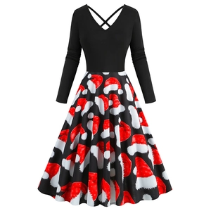 Detail of V-neck Christmas dress with red hat prints and criss-cross back straps