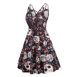 Detailed back view of V-neck skater dress with sugar skull print and crisscross straps