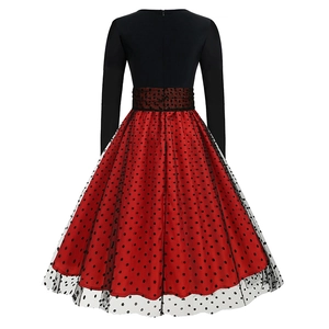 Detail of the back view showing an invisible zipper and retro red polka dot mesh layers
