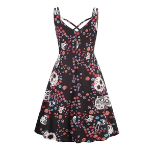 Detail of V-neck gothic dress with Mexican sugar skull and pumpkin floral print patterns