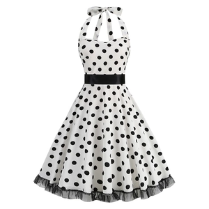 Retro 1950s polka dot dress with halter neck, satin belt and lace hem detail