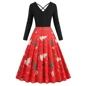 Detail of cross V-neck back design and festive Christmas print on red flared skirt