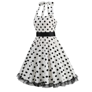 Detailed view of polka dot dress with mesh hem and satin waist belt decoration