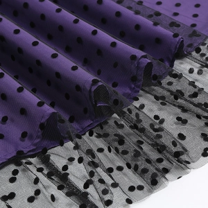 Detailed view of purple satin fabric and double-layered black polka dot tulle mesh