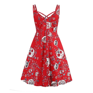 Detail of V-neckline with criss-cross straps on a red Halloween sugar skull print dress