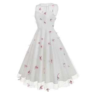 Detailed view of pink 3D butterfly embroidery on white mesh sleeveless party dress