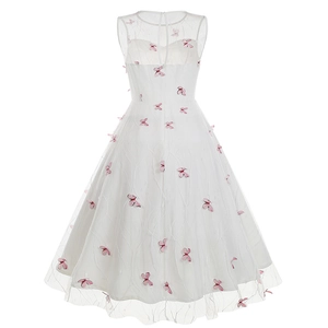 Detailed back view of white tulle dress featuring delicate pink 3D butterfly embroidery