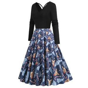 Detail of the cross-strap back and Christmas reindeer print on a long sleeve V-neck dress