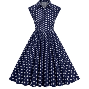 Vintage 1950s polka dot sleeveless dress with lapel collar and flared swing skirt
