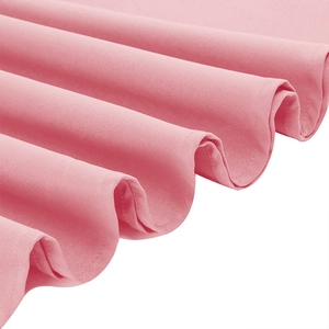 Detail shot of vintage pink mesh fabric with elegant pleated ruffles and soft texture