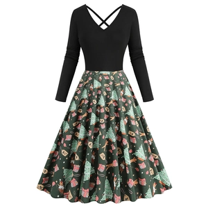 Close-up of vintage Christmas dress showing V-neck bodice and festive print detail