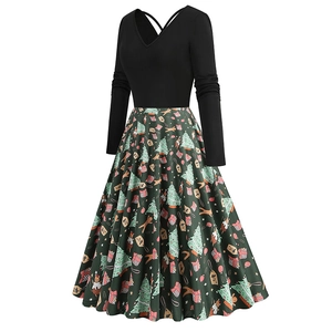 Detail view of V-neck bodice and Christmas print pattern on vintage long sleeve dress