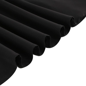 Detail of black gothic dress showing premium pleated fabric and neat edge stitching