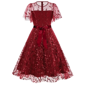 Detailed back view of burgundy evening dress with leaf sequins and satin bow belt