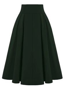 Close-up detail of high-waist pleated dark green midi skirt with rich fabric texture