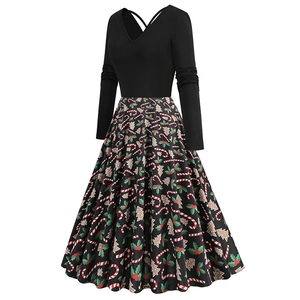 Detail of V-neck long sleeve dress with Christmas candy cane print and back strap design