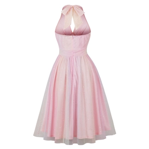 Pink halter cocktail dress back view with a large bow and silver sequins on mesh
