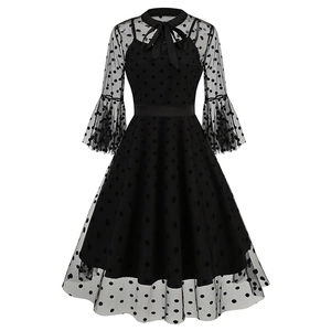 Vintage black polka dot mesh dress with ribbon bow neck and elegant flare sleeves