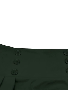 Detail of forest green retro skirt waist featuring decorative double-breasted buttons