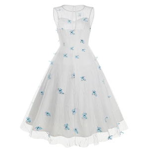 Detailed view of 3D blue butterfly appliques on white tulle sleeveless evening dress