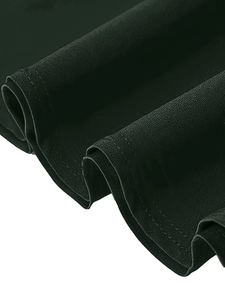 Detailed macro view of the premium fabric texture and neat stitching on a vintage skirt