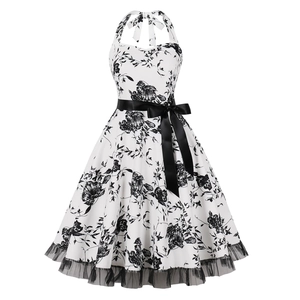 Abito vintage anni '50 allacciato al collo con stampa floreale bianca e nera e fiocco