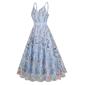 Detailed view of floral embroidery on light blue V-neck mesh dress with spaghetti straps