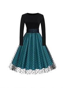 Vintage long sleeve A-line dress with emerald green satin and black polka dot mesh overlay