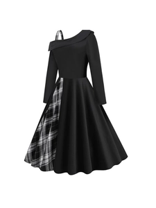 Elegant black asymmetric dress with long sleeves and stylish black and white plaid panels