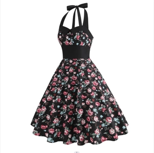 Vintage 1950s floral halter dress with black belt and rose print for women