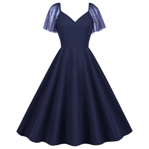 Vintage navy blue mesh dot puff sleeve dress with a sweetheart neckline and flare skirt