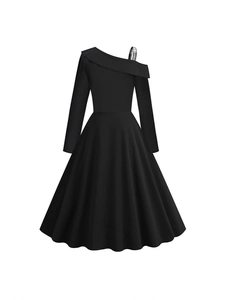 Elegant black asymmetric one-shoulder dress with a contrast plaid strap and flared skirt