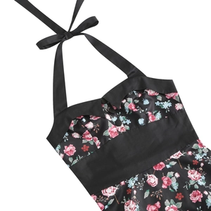 Vintage 50s black halter dress with pink rose floral print and decorative buttons
