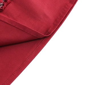 Deep red vintage cocktail dress with detailed lace stitching and premium fabric texture