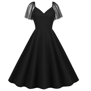 Vintage Audrey Hepburn style black dress with mesh patchwork and flare puff sleeves