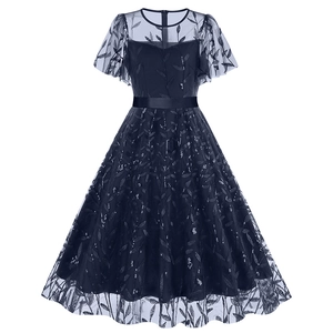 Mesh dress with leaf embroidery, sequins and satin belt on white background