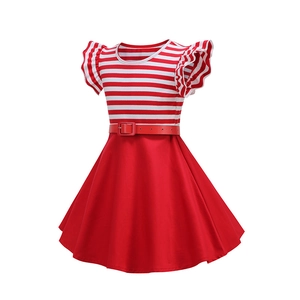 Detail of red and white striped dress with ruffled shoulders and a buckled waist belt