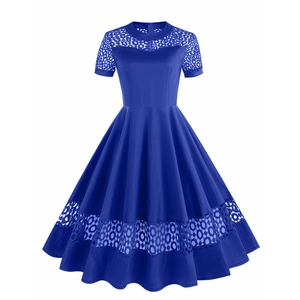 Detailed view of royal blue cocktail dress featuring hollow lace splicing and A-line silhouette