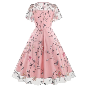 Detail of floral embroidery on pink mesh A-line dress back with hidden zipper