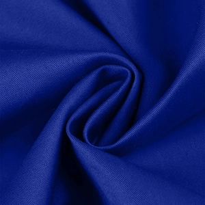 Close-up of royal blue twill fabric showing soft texture and high-quality material draping