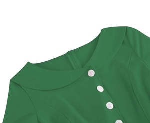 Detail of green vintage dress showing Peter Pan collar white buttons and back zipper