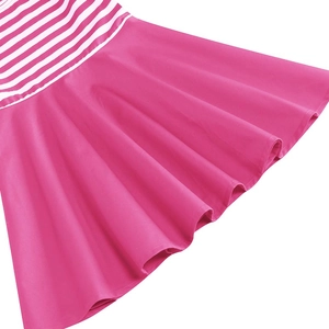 Detail of girls vintage dress showing fuchsia pleated skirt and pink striped bodice