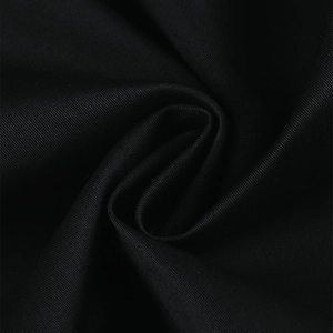 Detailed macro view of black twill fabric texture for vintage cocktail party dresses