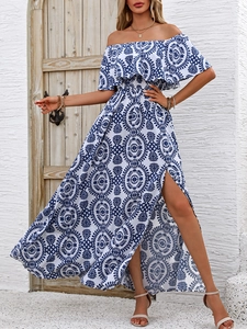 Detail view of the elegant off-shoulder floral maxi dress with high side slit and blue prints