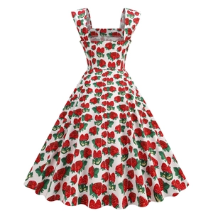 Detail view of the back of a square neck vintage A-line dress with strawberry print
