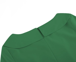 Detail view of the green vintage dress neckline with a wide collar and invisible back zipper