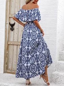 Elegant off-shoulder maxi dress with blue mediterranean print and flowy silhouette